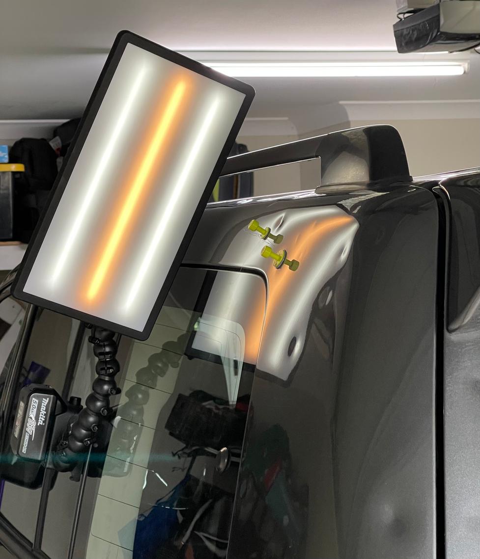 PDR reflection lighting and glue tabs on a vehicle panel at Peak Country