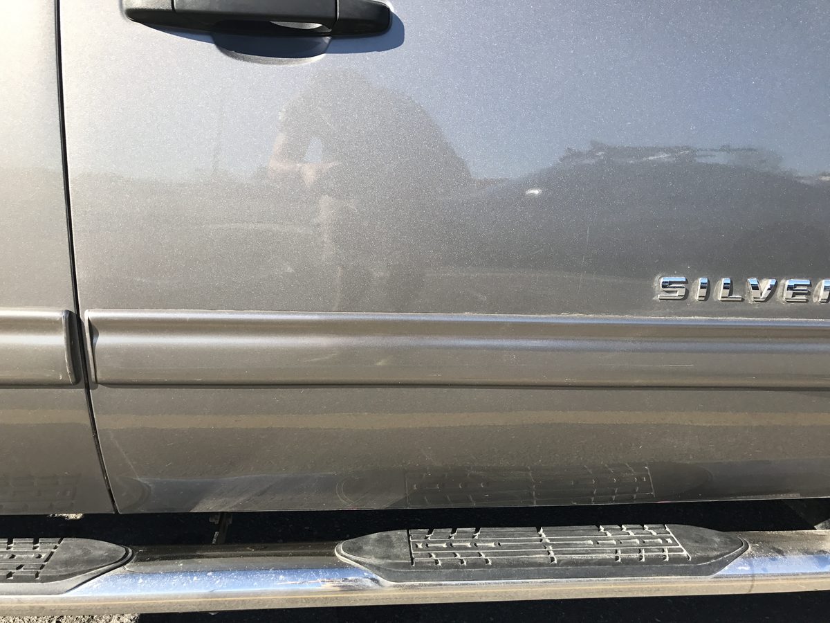 2013 Chevrolet Silverado door panel after paintless dent repair